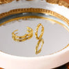 Pair of dainty gold hoop earrings with crystal accent – elegant and lightweight earrings for women.