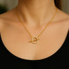 Gold-plated circle bar pendant necklace with crystal detailing – trendy minimalist jewelry