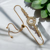 Shimmering gold adjustable bracelet with CZ stones in sunlight