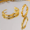 Minimalist gold hoop earrings with diamond accent – premium gold finish, perfect for everyday wear.